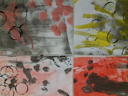 kuvassa lasten maalaamia ympyröitä värikkäällä pohjalla