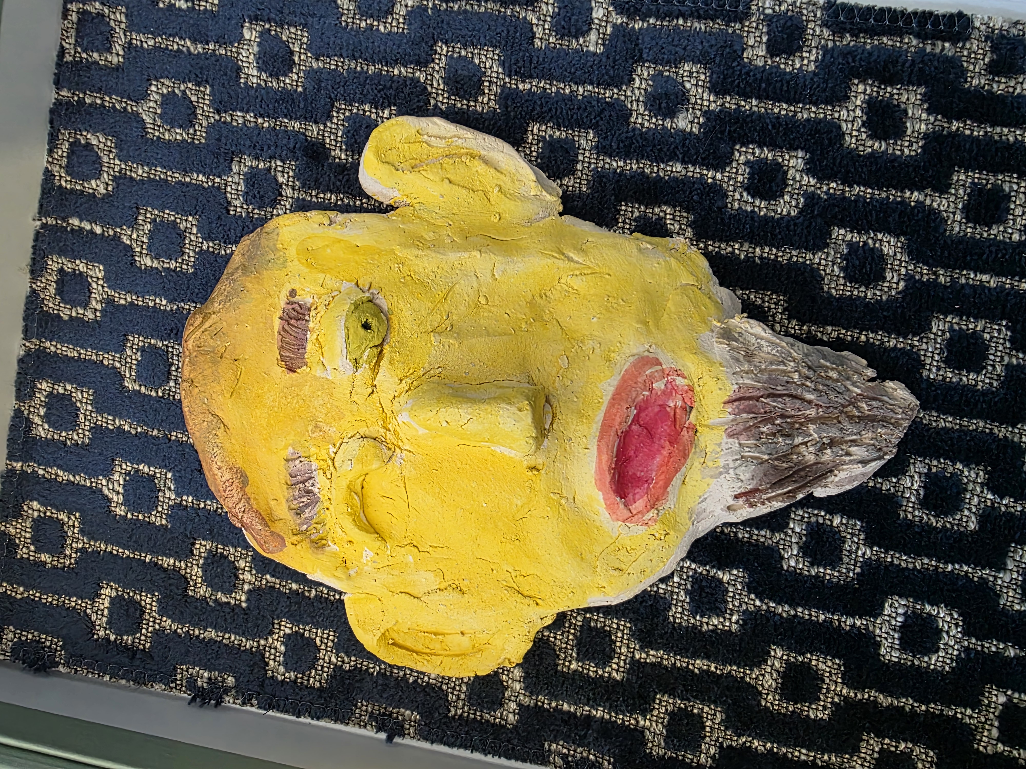 Lähikuvassa keramiikkakasvot