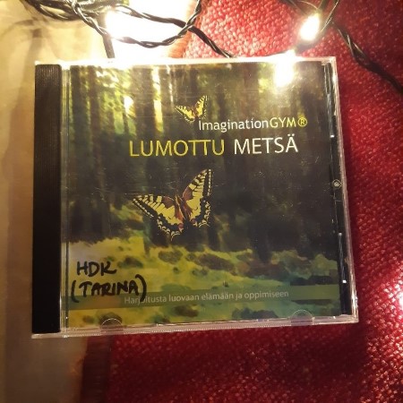 kuvass cd -levyn "lumottu metsä" kansikuva